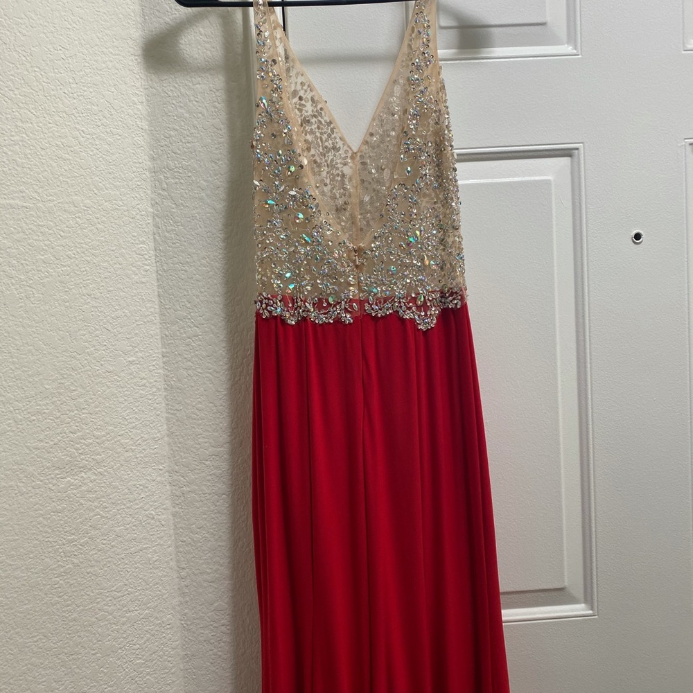 Red dress. With sparkles and stones. Size xs. Very chic
